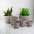 szarobezowe-donice-ceramiczne-z-podstawkami.jpg